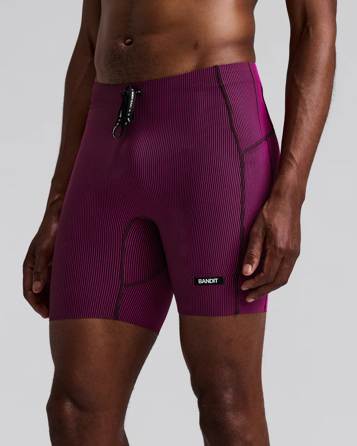 BANDIT RUNNING MEN'S STRIPED CADENCE™ QUARTER TIGHTS