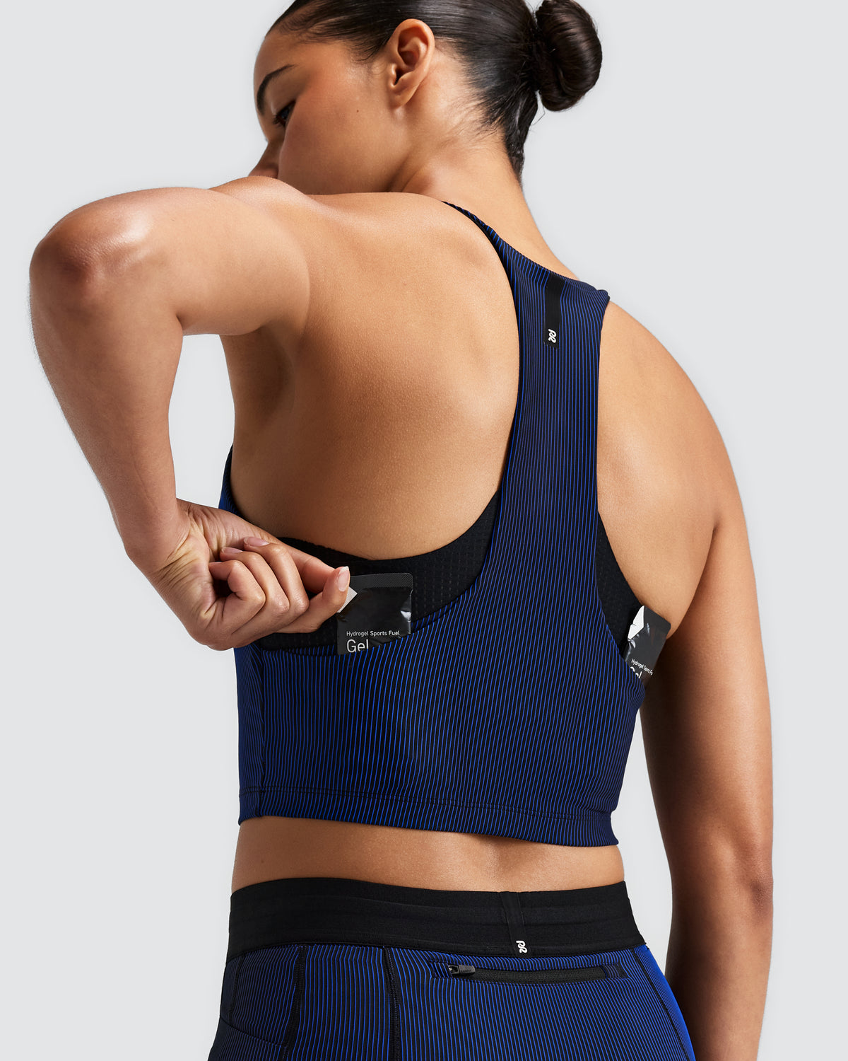 BANDIT RUNNING Women's Striped Cadence™ Pop Stitch V-Neck Race Crop