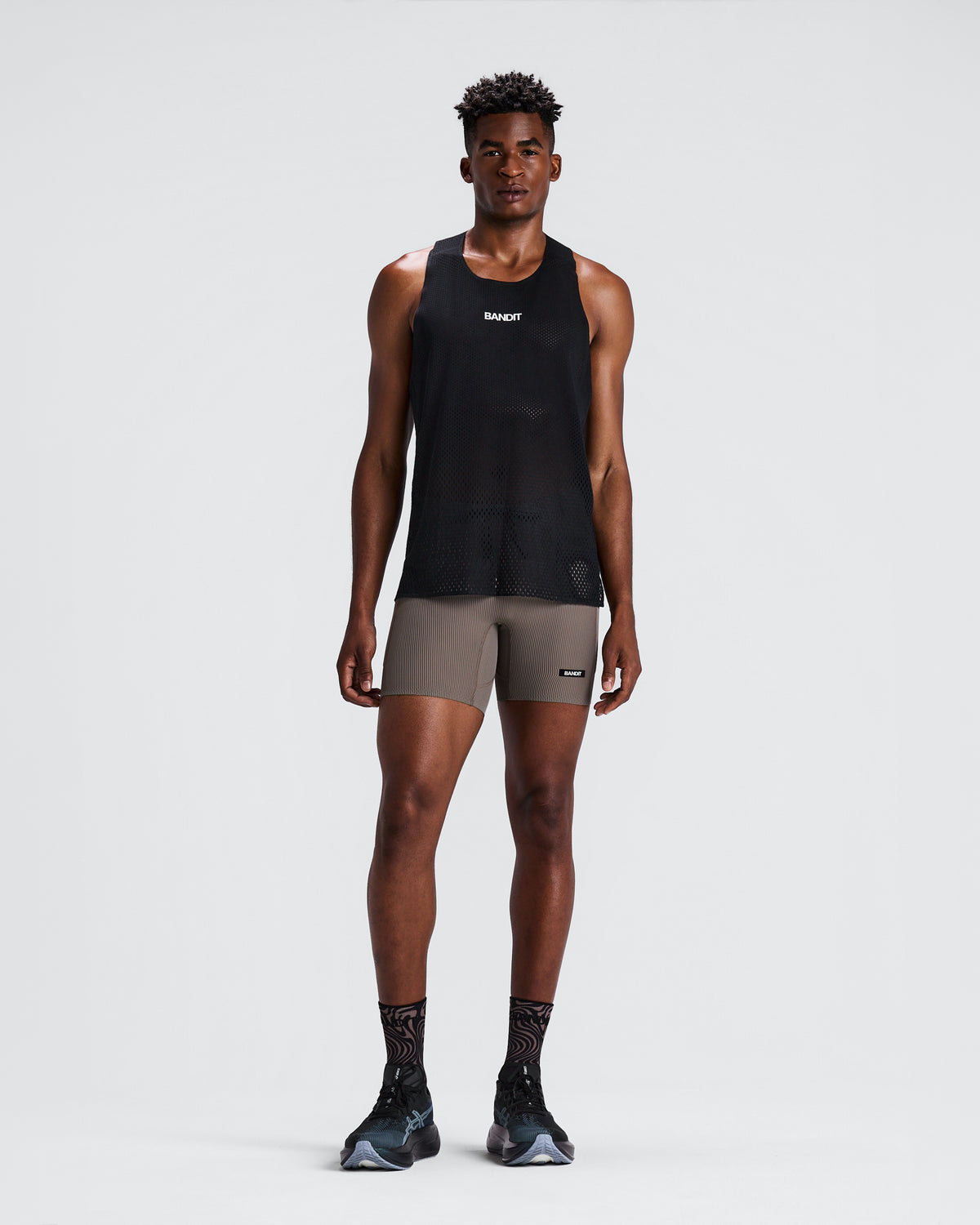 BANDIT RUNNING STRIPED CADENCE QUARTER TIGHT