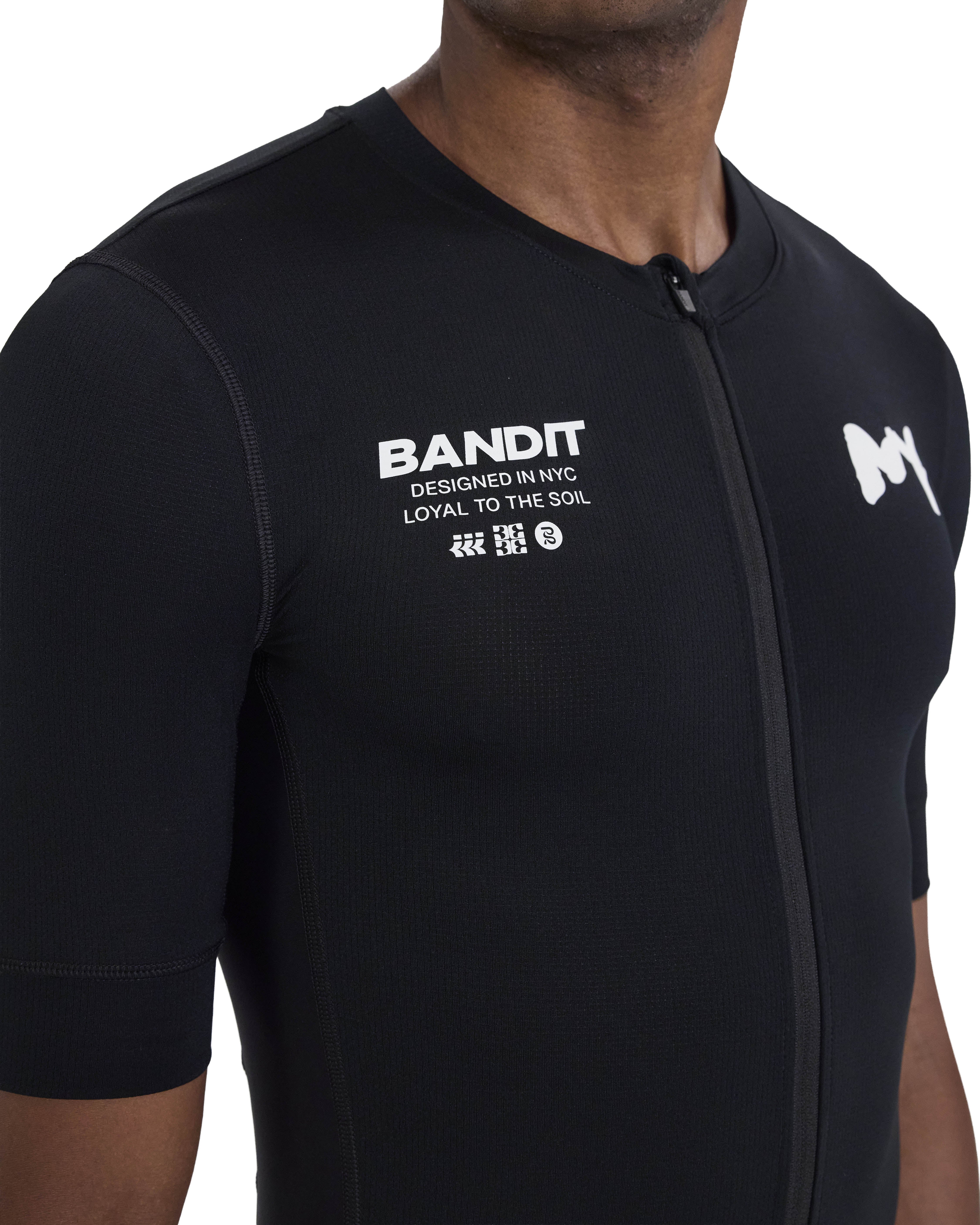 Bandit Running Pieced Short Sleeve Zip Top