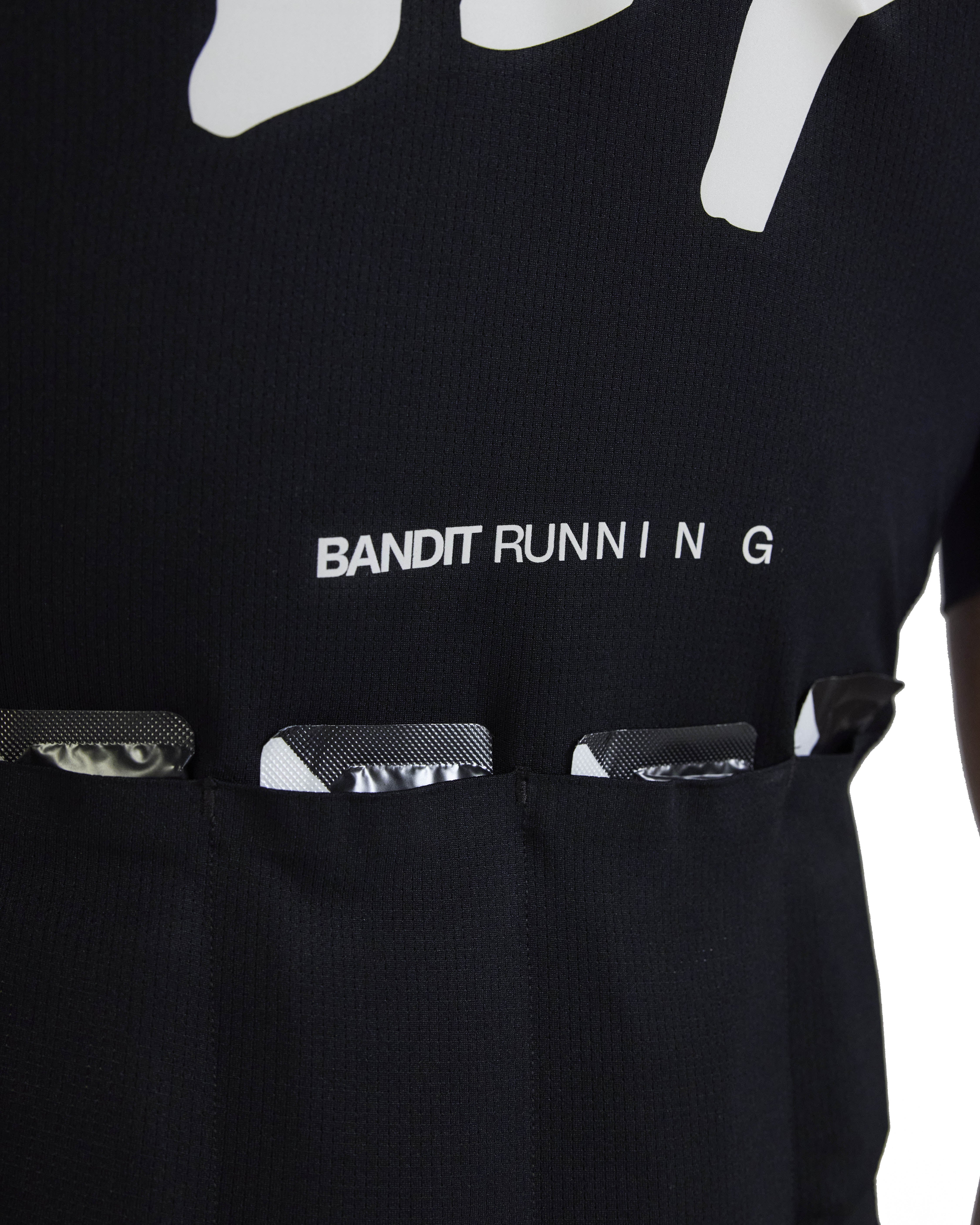 Bandit Running Pieced Short Sleeve Zip Top