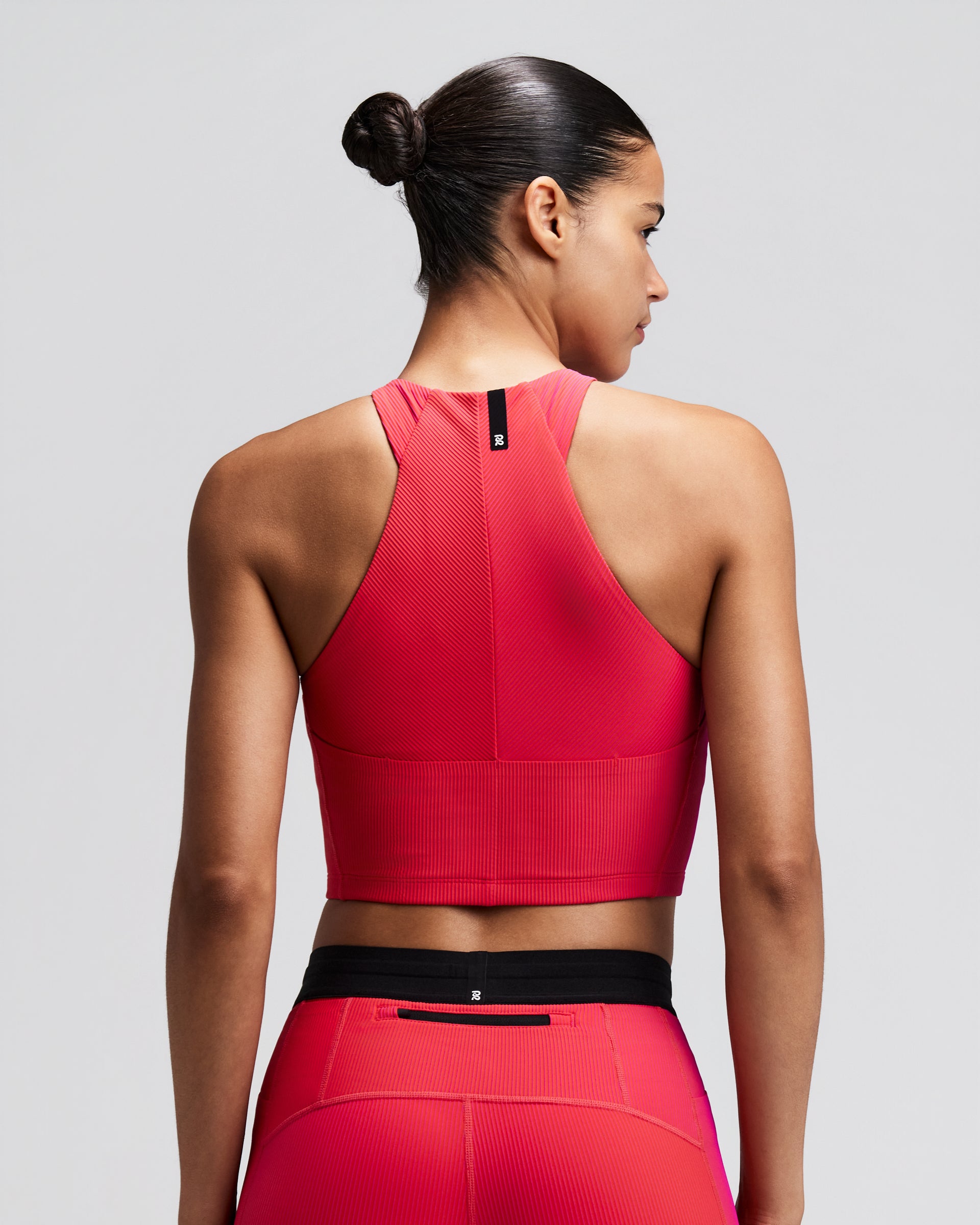 BANDIT RUNNING STRIPED CADENCE ZIP FRONT HALTER CROP