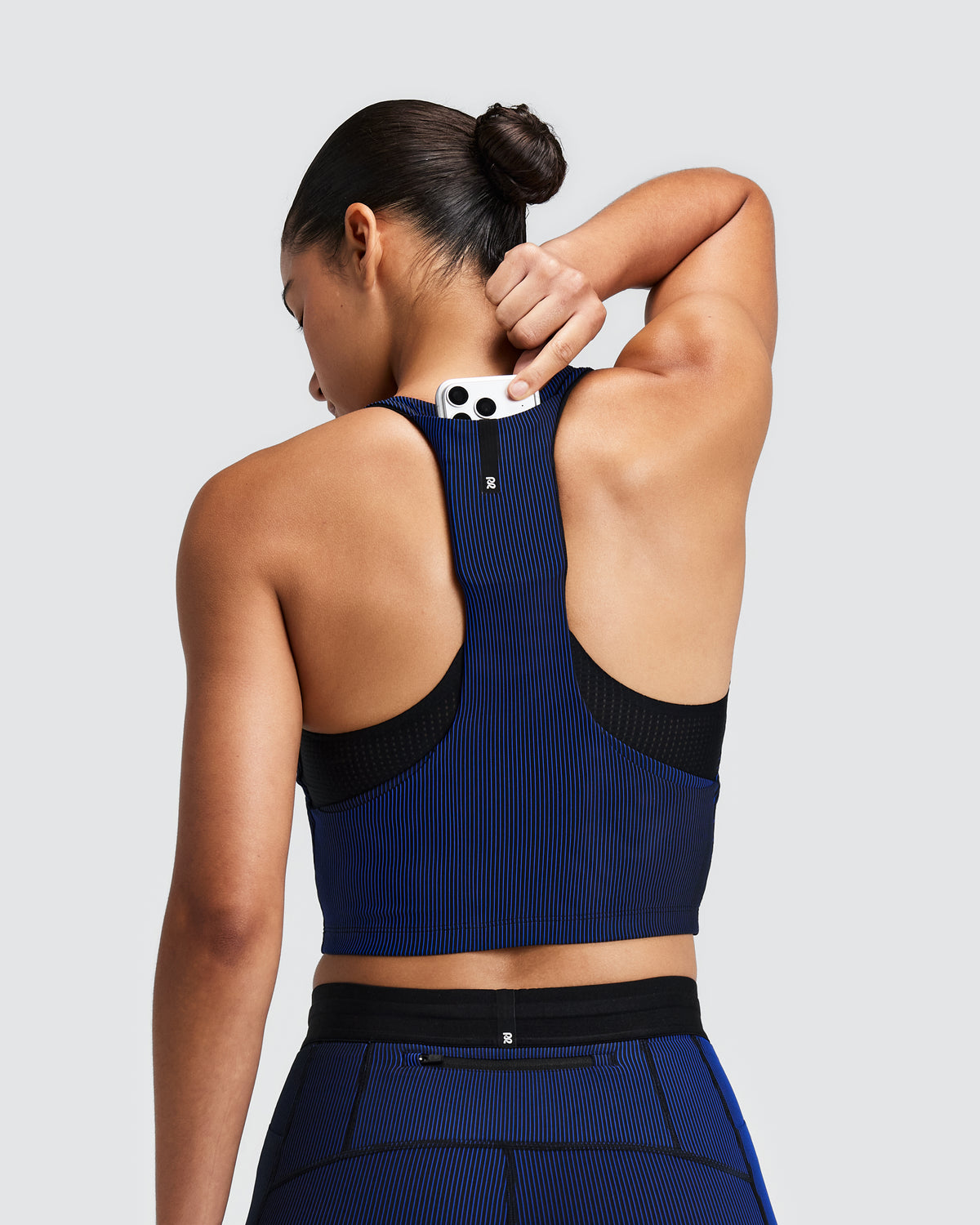BANDIT RUNNING Women's Striped Cadence™  Pop Stitch V-Neck Race Crop