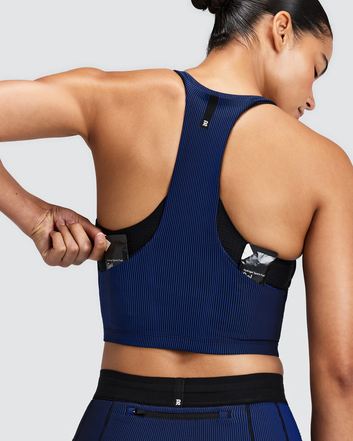 BANDIT RUNNING Women's Striped Cadence™  Pop Stitch V-Neck Race Crop