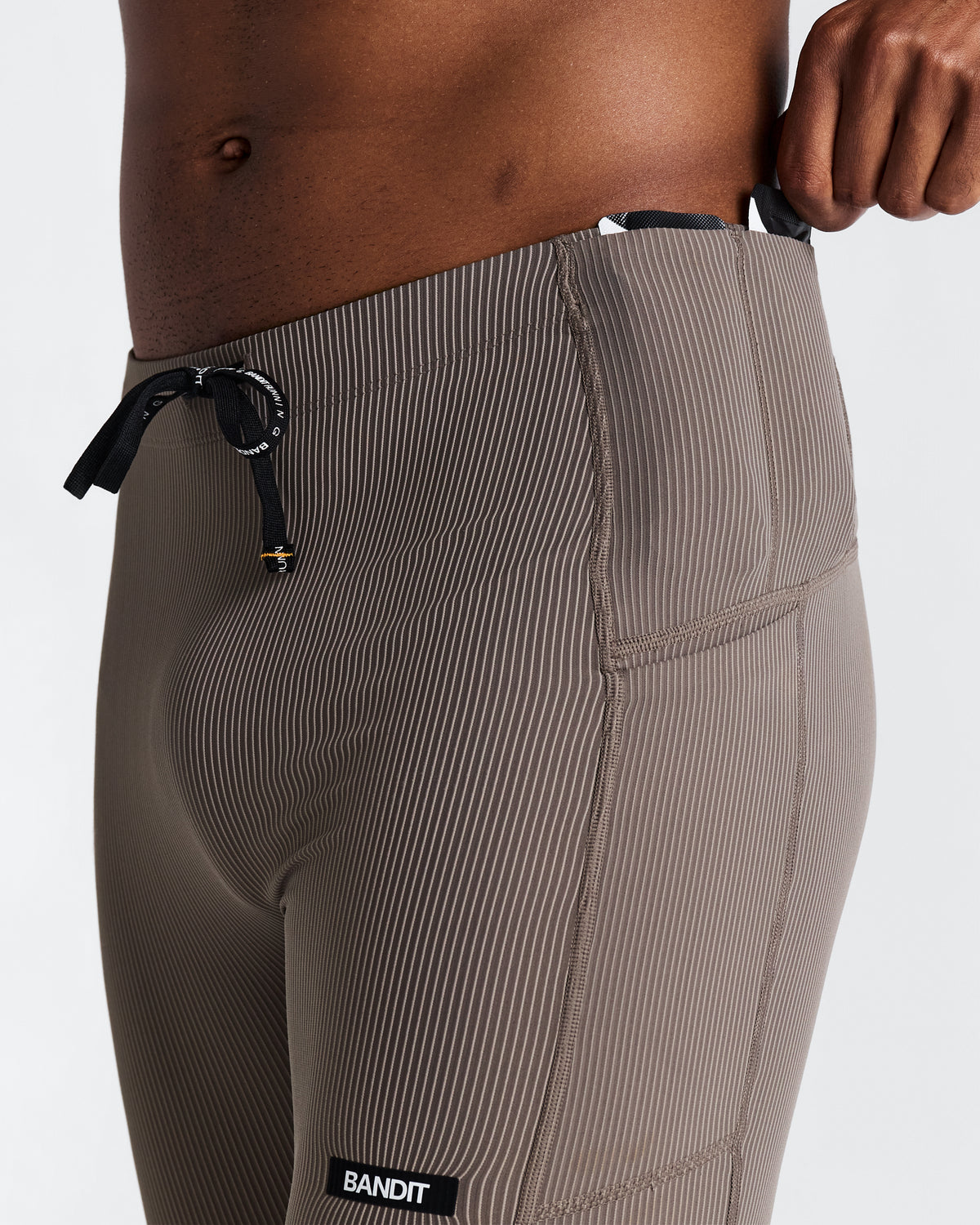 BANDIT RUNNING STRIPED CADENCE QUARTER TIGHT