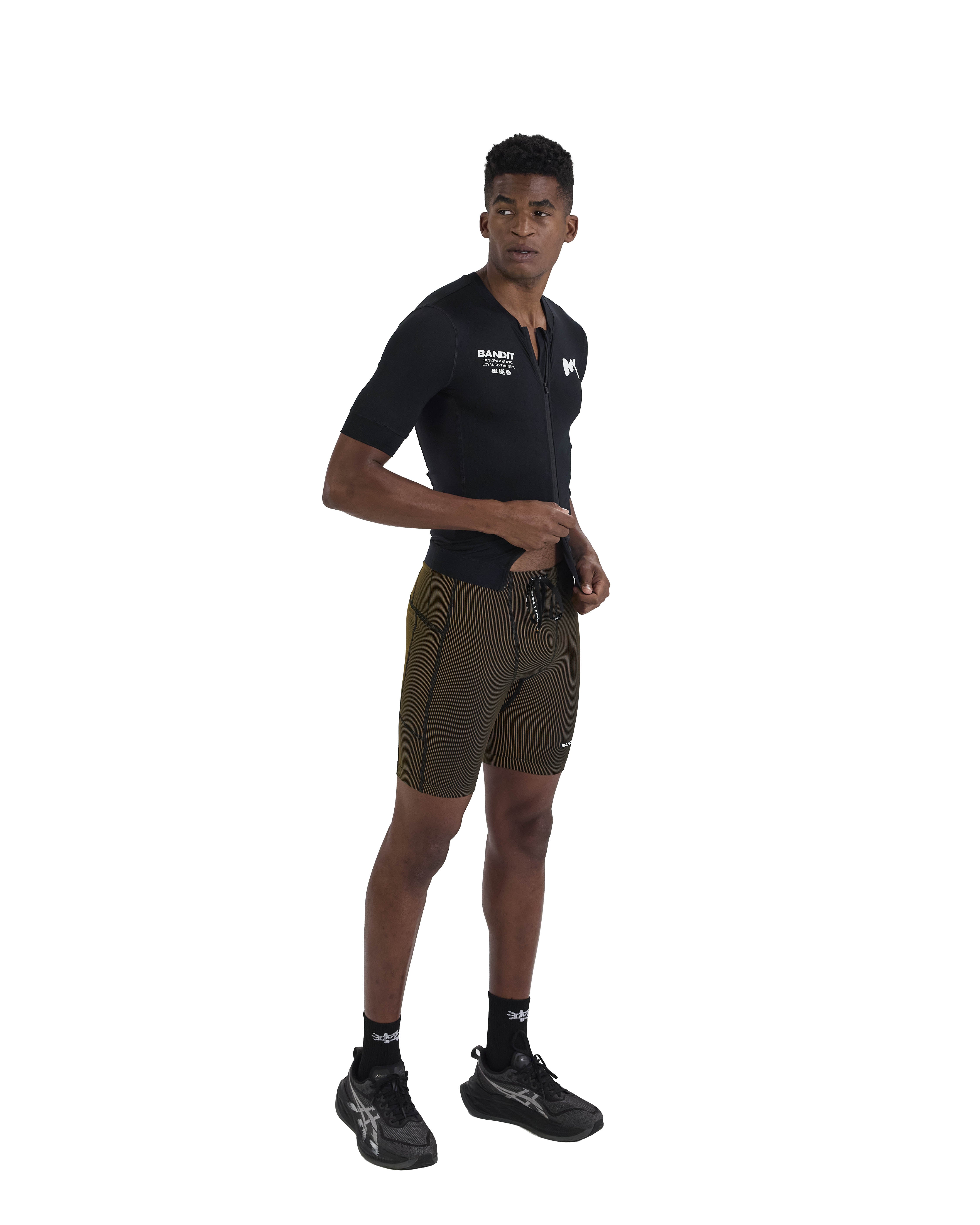 Bandit Running Pieced Short Sleeve Zip Top